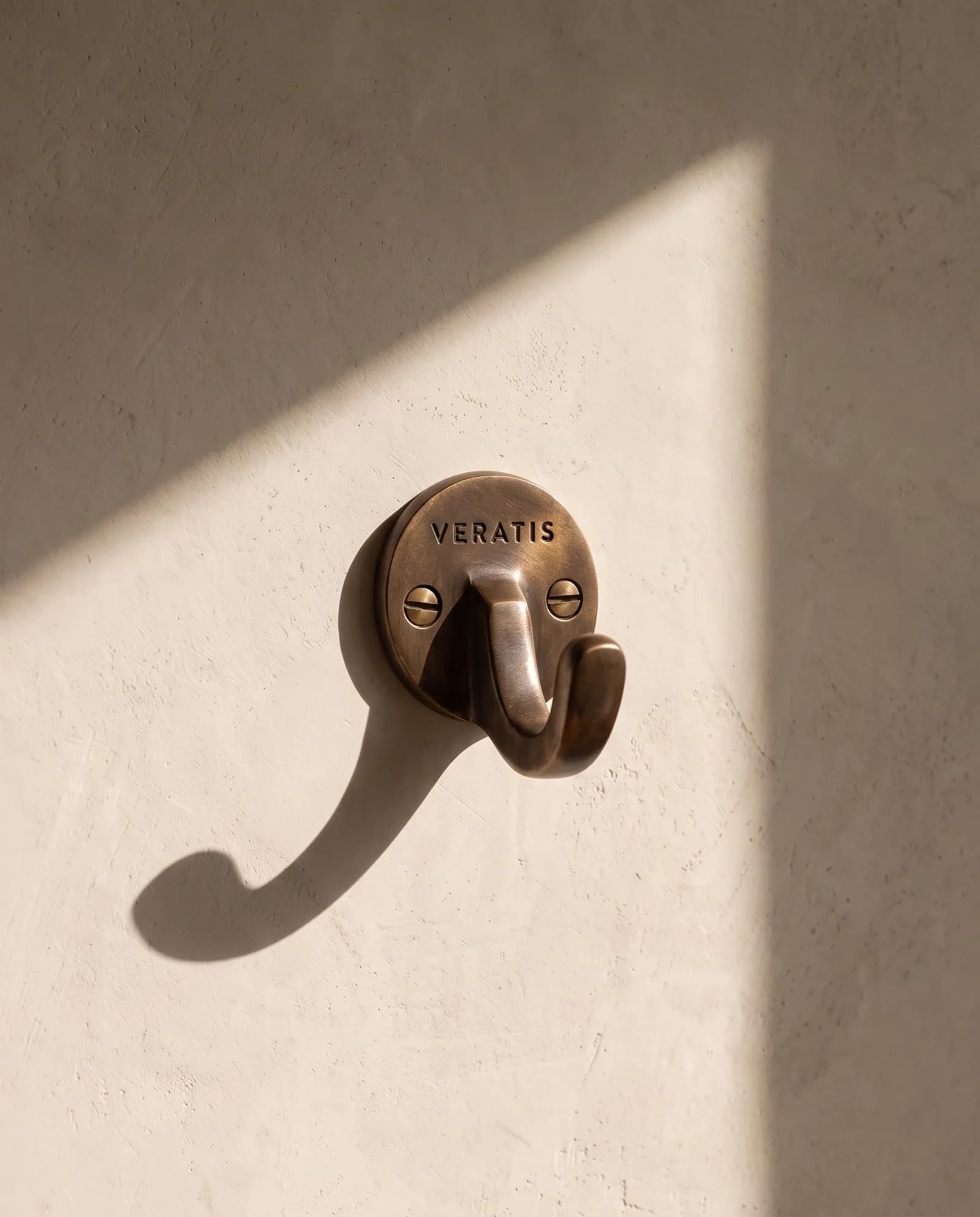 Brass Wall Hook — Single solid brass hook with fixings